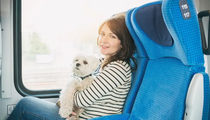 Girl in flight with dog | how to travel with pets in flight