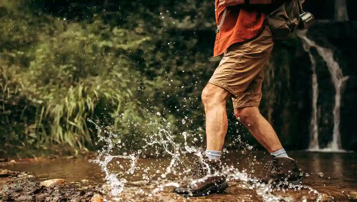 Men Crossing water path and wearing waterproof shoes | Best Waterproof Boots For Men