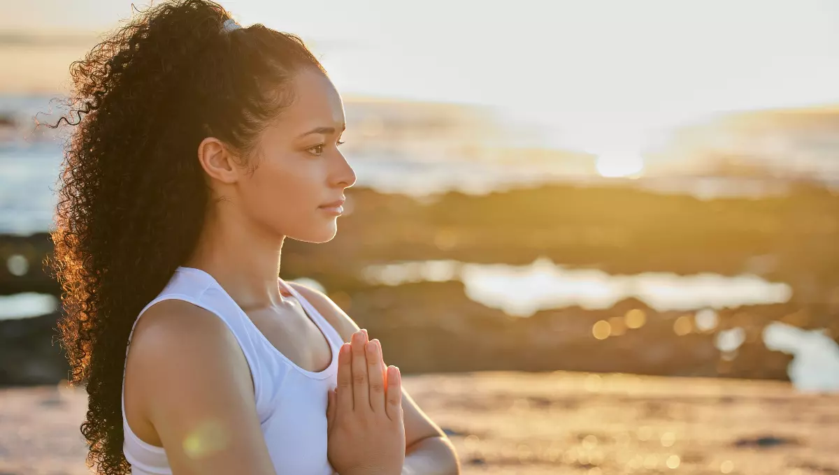 A Women Doing Yoga in morning to Prepare mind and body